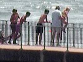 Man caught on camera apparently HELPING girl tombstone off pier at Langstone Harbour, Hampshire